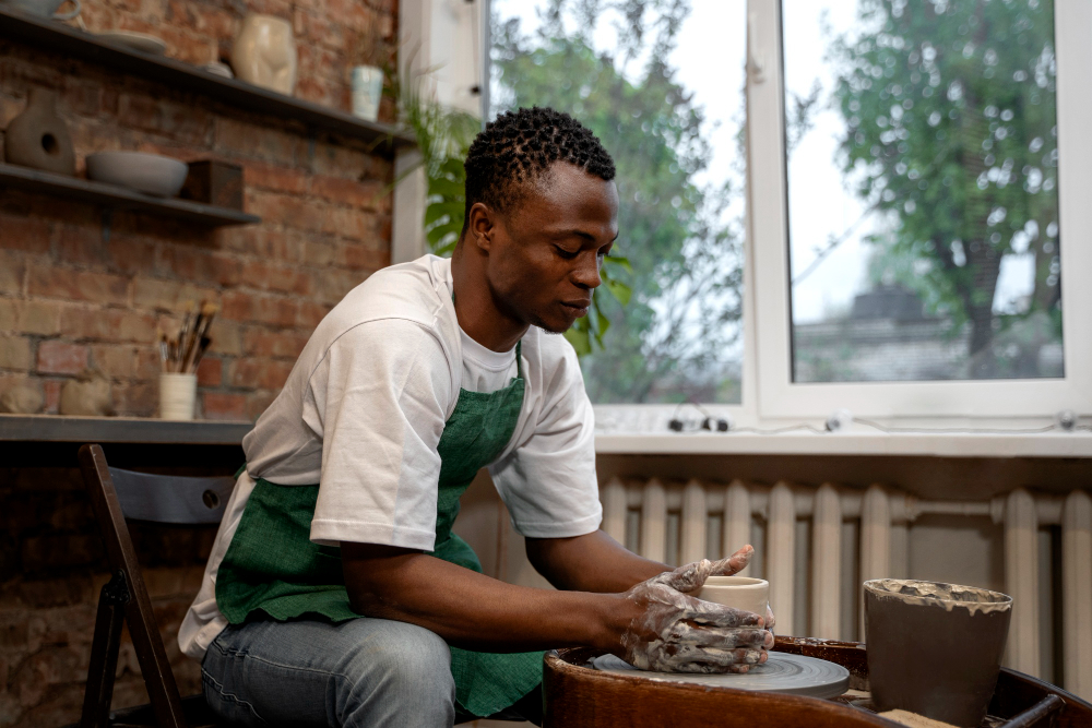 Potter working at a pottery wheel